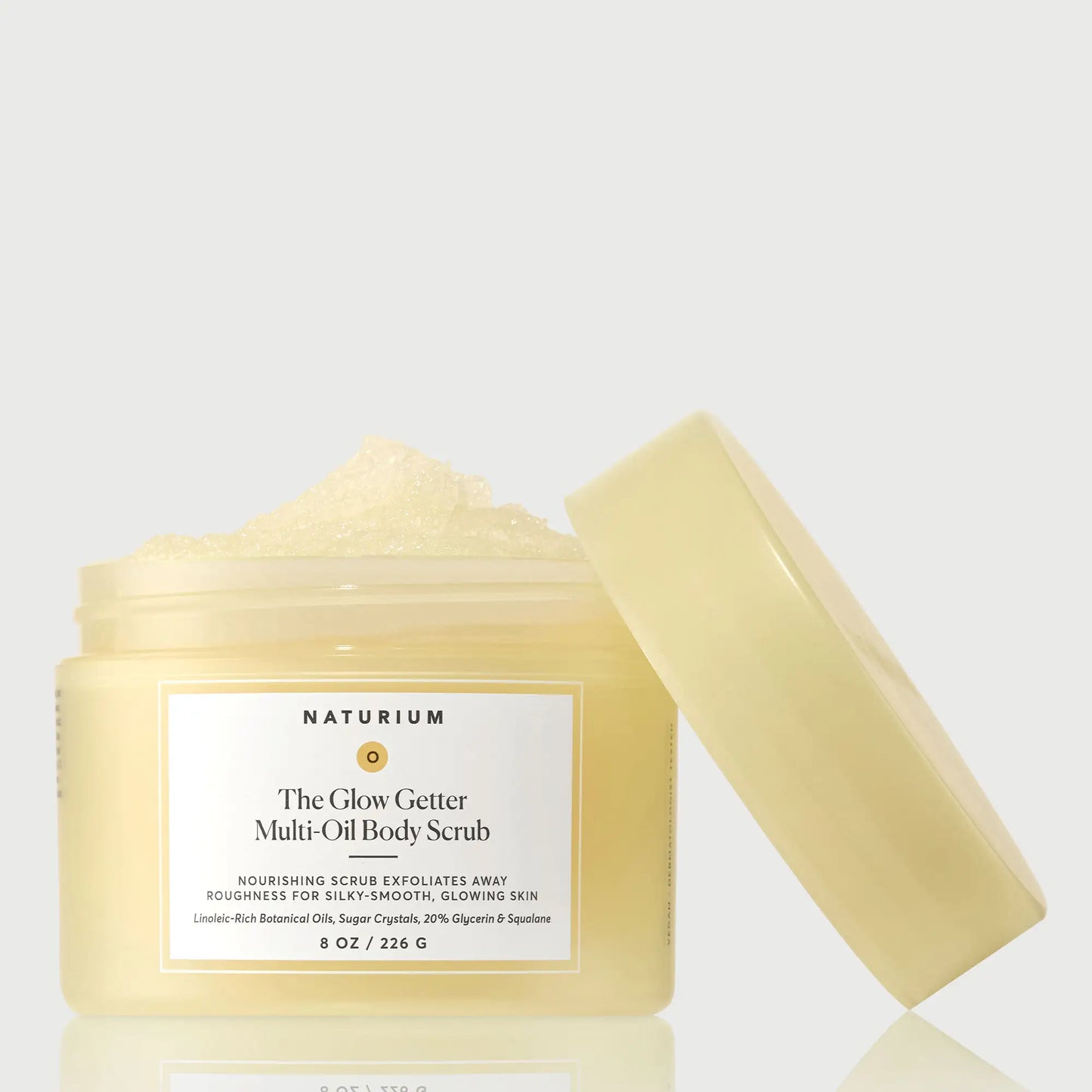 the-glow-getter-multi-oil-body-scrub-s5 NATR-40028-GlowGetter-Multi-Oil-Body-Scrub-Front-CapOff-bonebkgd.webp