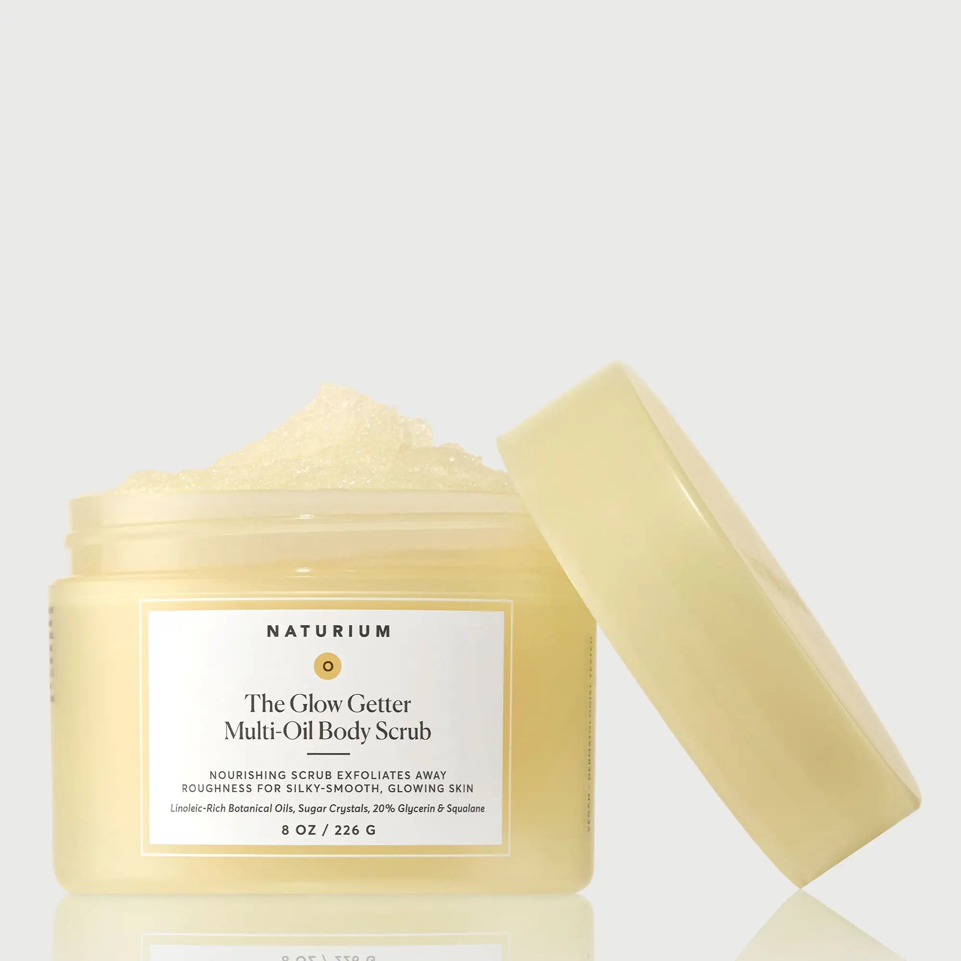 the-glow-getter-multi-oil-body-scrub-s5 NATR-40028-GlowGetter-Multi-Oil-Body-Scrub-Front-CapOff-bonebkgd.webp