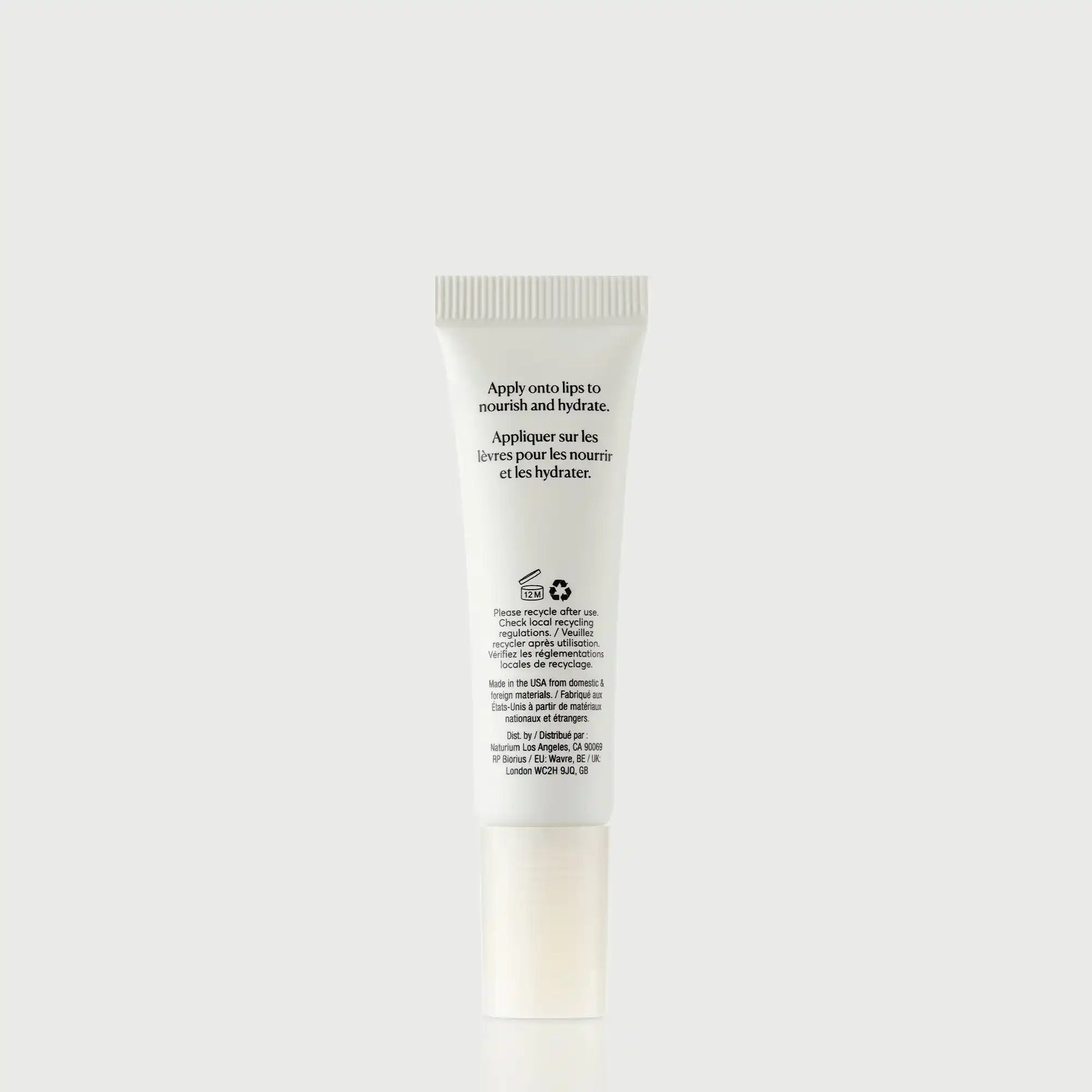 phyto-glow-lip-balm-clear-g4 NATR-60066_PhytoGlow_Clear_primary_capon_back-bonebkgd.webp