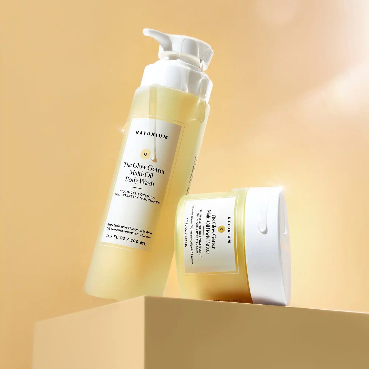 the-glow-all-out-body-bundle-l5 gg-bodybutter_1464-crop_revcolor_FL.webp
